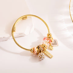 Gold and Pink Heart Charm Bangle