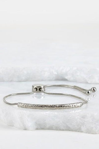 Curved Textured Metal Bar Bracelet with Adjustable Pull Tie